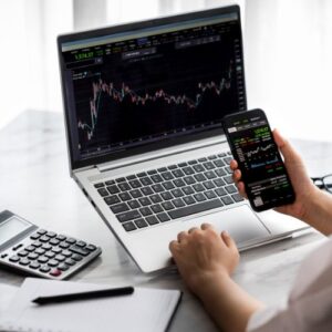 online investing phone and laptop